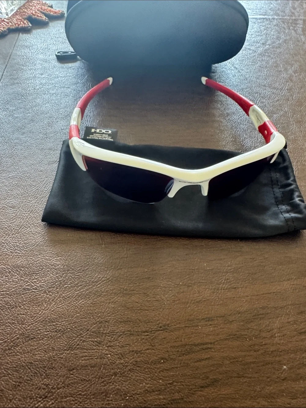 Oakley FLAK Boy’s White/Red Frame Sunglasses with blue Mirrored Lenses